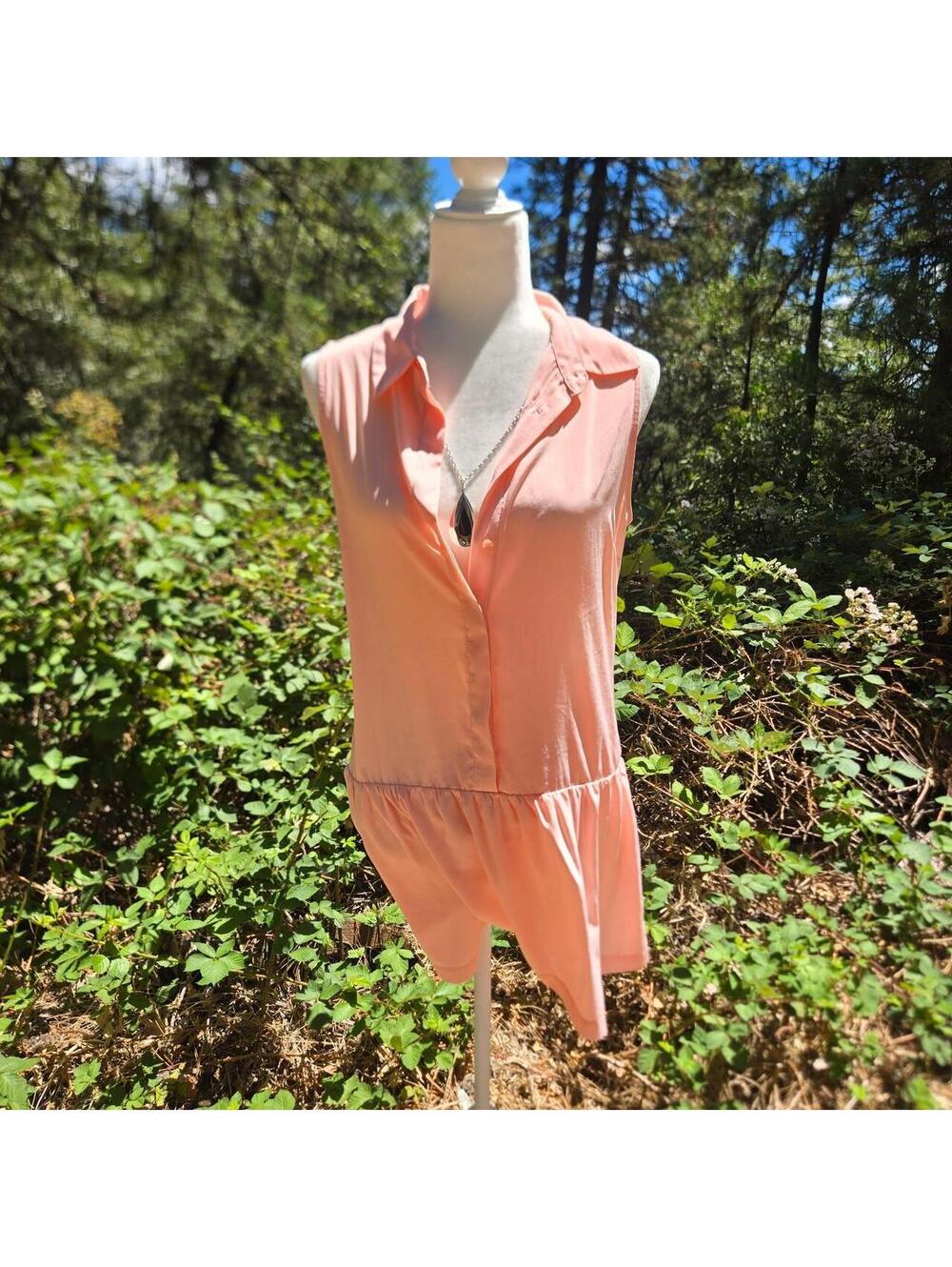 This Mimi Chica sleeveless summer dress is a charming addition to any warm day.